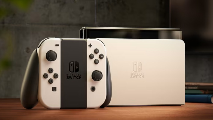 Nintendo Switch OLED on a table.