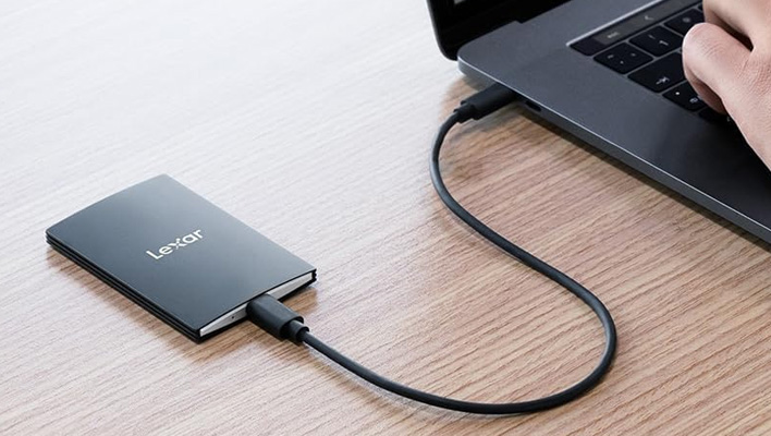 Lexar SL500 portable SSD hooked up to a laptop.