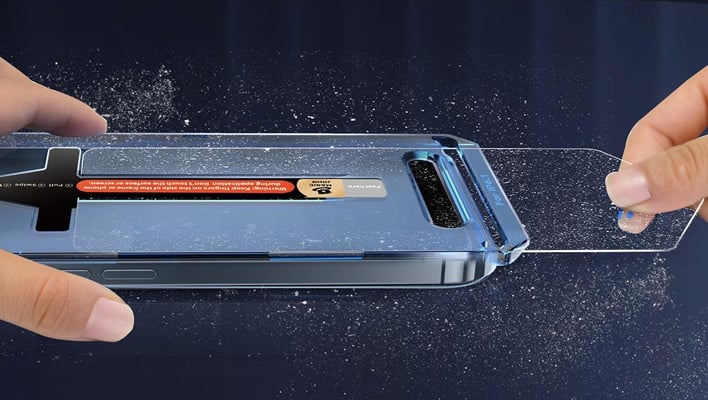 Magic John screen protector removing dust.