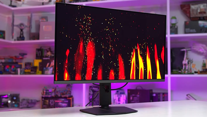 MSI MPG 321URX QD-OLED monitor on a desk.