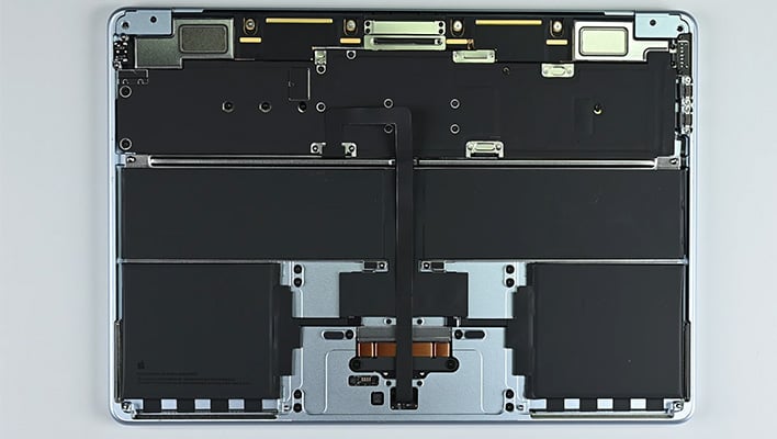 Apple M4 MacBook Air with the chassis cover removed.