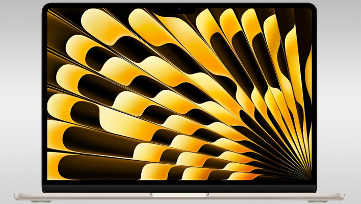 MacBook Air on a gray gradient background.