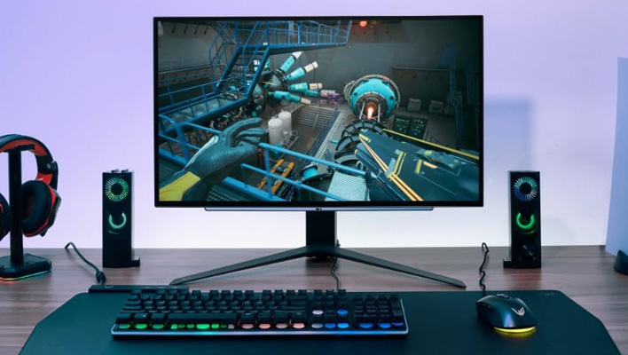 LG UltraGear OLED monitor on a desk.