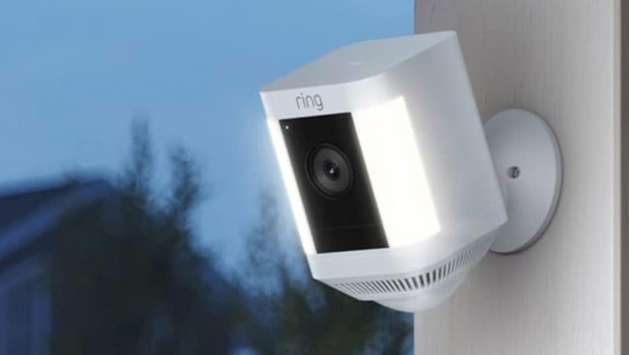 Ring Spotlight Cam Plus on the side of a house.