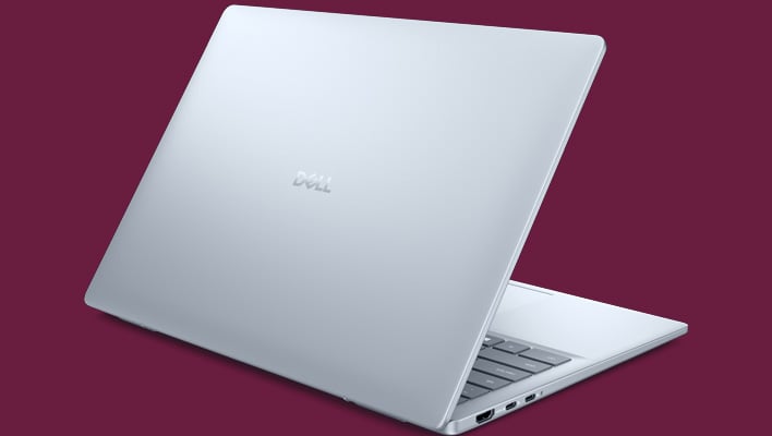 Dell 14 Plus on a pink background.