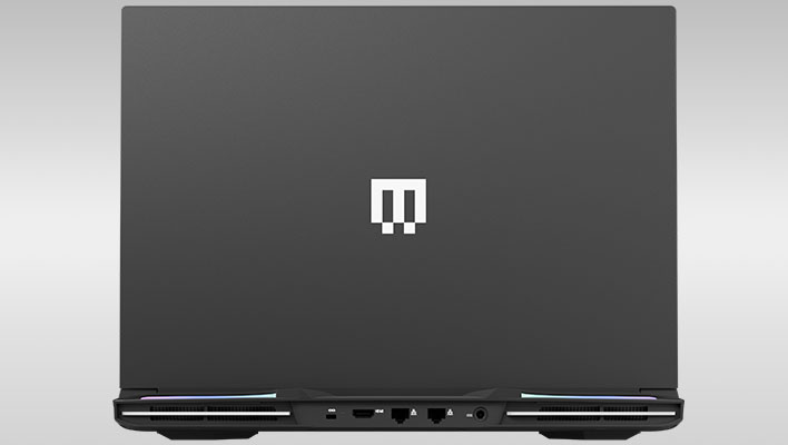 Rear view of the ports and lid on Maingear's Ultima 18 gaming laptop on a gray gradient background.
