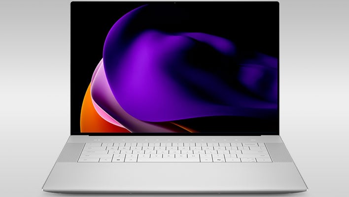 Front render of the Dell 16 Premium laptop on a gray gradient background.