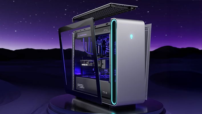 Alienware Area-51 gaming desktop in front of darkened mountains and a night sky.