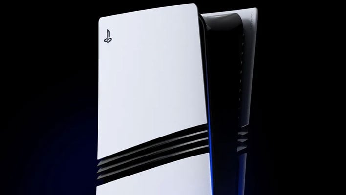 Top closeup of the PS5 Pro on a black background.