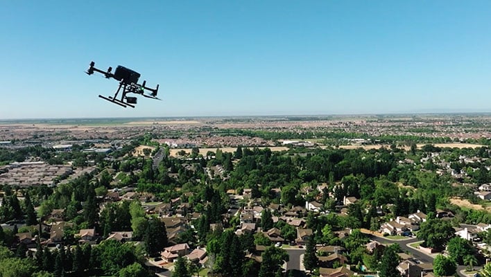 A Flock Safety drone flying.