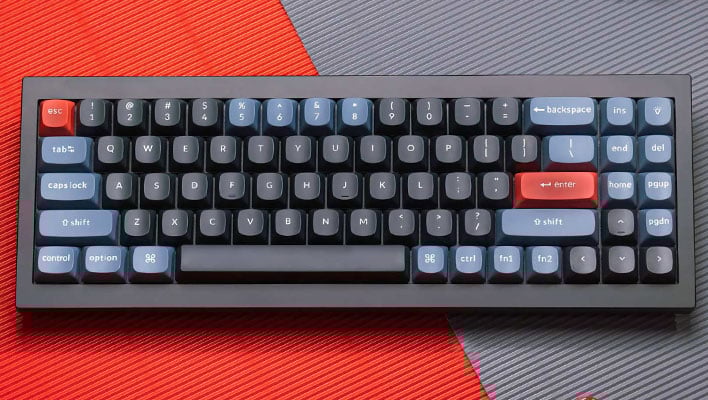 Keychron Q7 keyboard on a red and gray background.