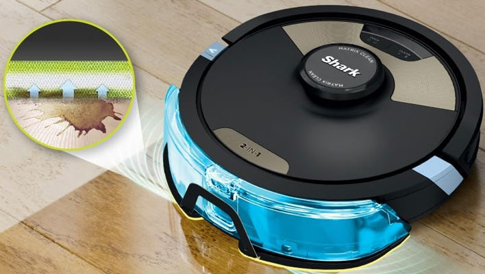 Shark AV2610WA robot vacuum and mop combo mopping a wooden floor. 