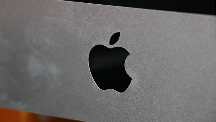 Closeup of an Apple logo.