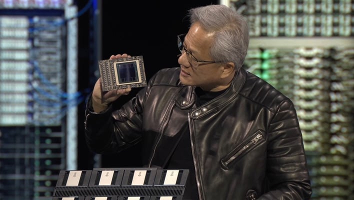 NVIDIA CEO Jensen Huang holding Blackwell Ultra GB300.