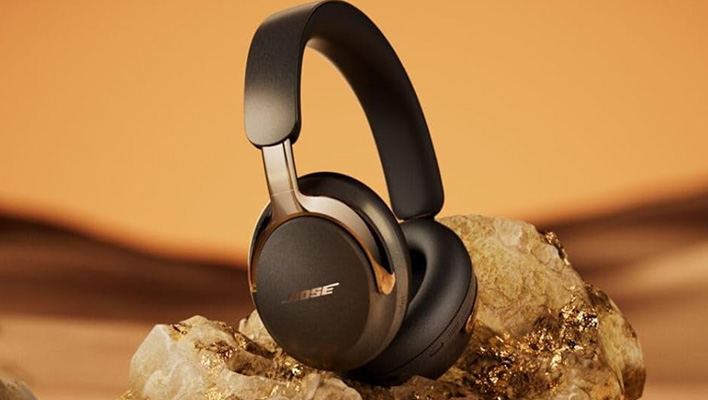 Bose QuietComfort Ultra Headphones (2nd Gen) on a rock.