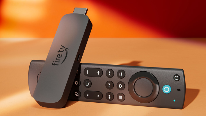 Amazon Fire TV Stick 4K Max with remote on an orange background.