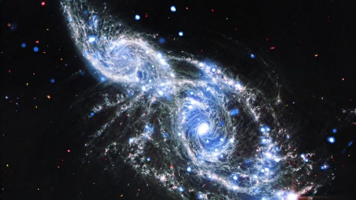 NASA's Webb Captures Spiral Galaxies Colliding In Unprecedented Detail