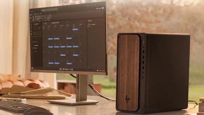 HP OmniDesk PC on a desk.