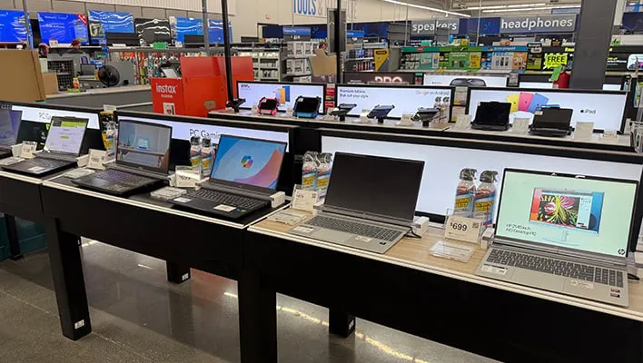 A row of laptops at Walmart.