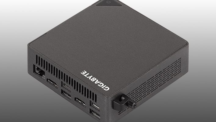 Angled render of Gigabyte's Brix mini PC on a gray gradient background.