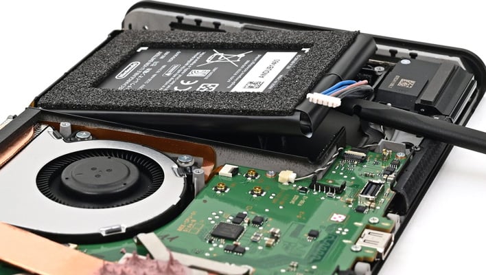 Battery being removed from Nintendo's Switch 2 handheld.
