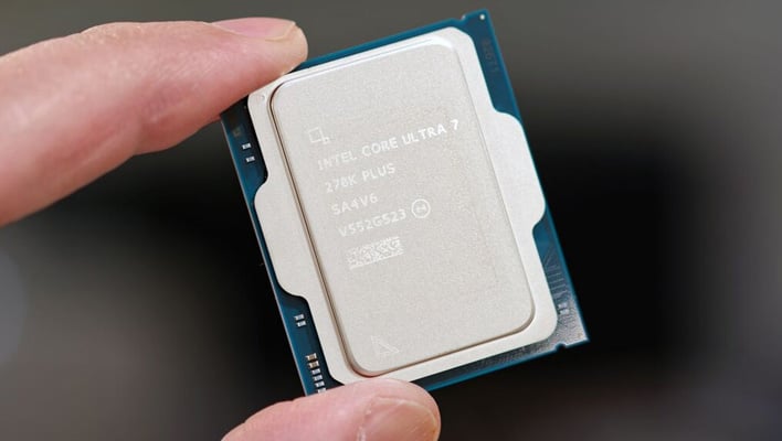 Holding an Intel Core Ultra 7 270K Plus CPU between two fingers.
