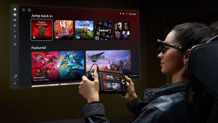 Person playing with an ASUS ROG Xbox Ally X20 handheld and wearing ROG XReal R1 Edition AR glasses. 