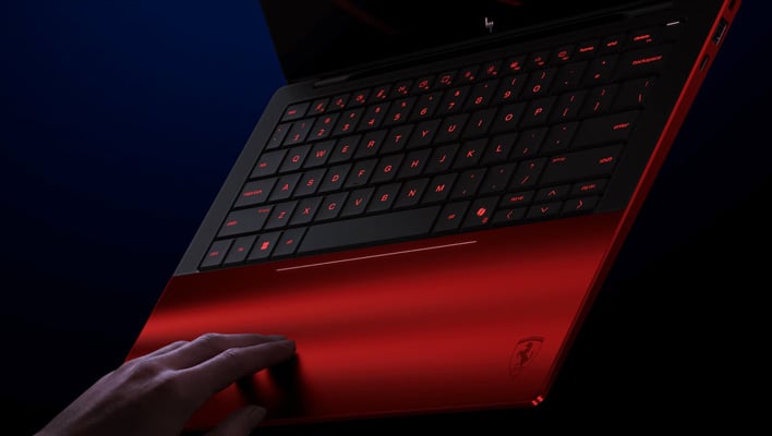 Angled render of the HP Scuderia Ferrari laptop showing the keyboard and trackpad. 