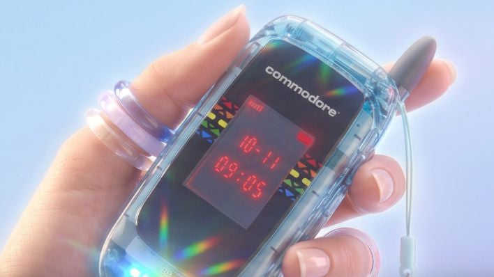 Commodore Callback 8020 flip phone in a hand.