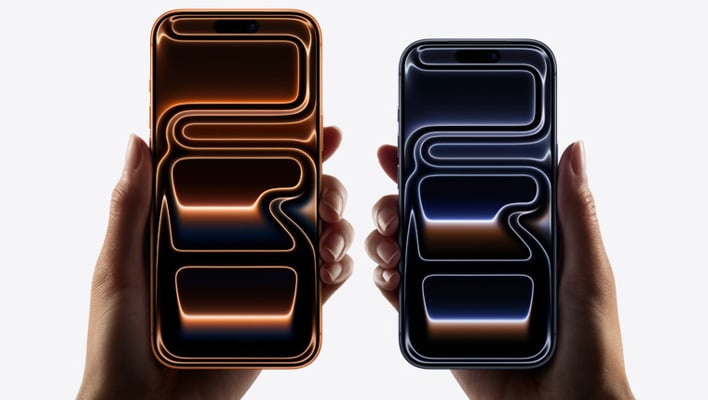 Hands holding a couple of iPhone 17 devices.