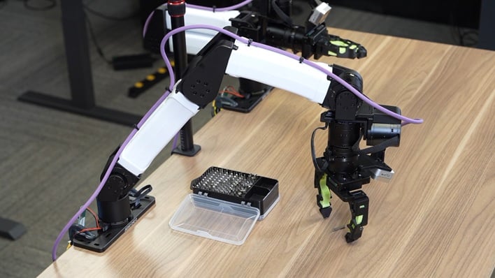 nvidia robotic arm picking up pin
