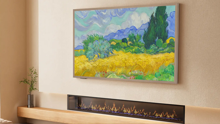 Hisense S7 Series CanvasTV on wall above a fireplace.