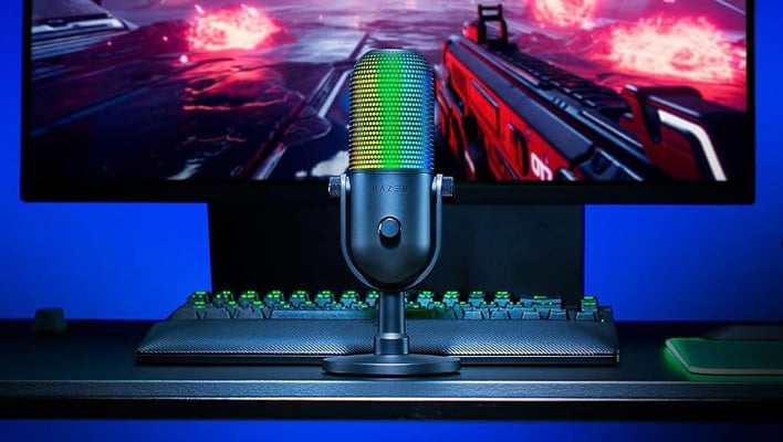 Razer Seiren V3 Chroma 32-bit DSP mic in front of a monitor.