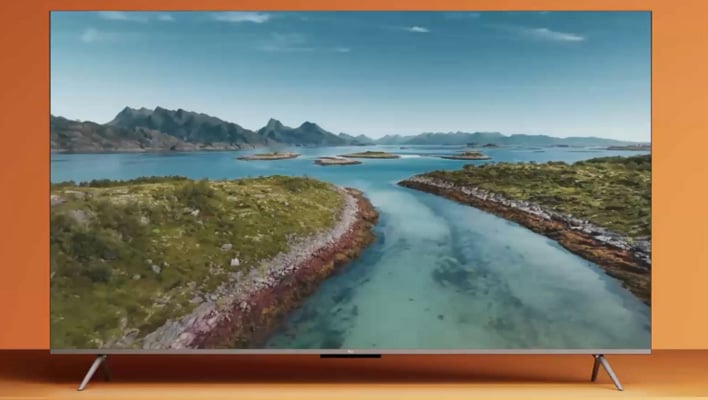 Amazon Ember QLED Fire TV on an orange background.