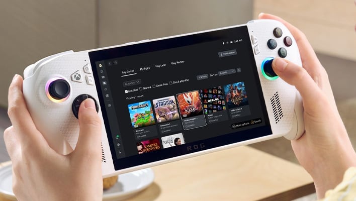 Person holding an ASUS ROG Xbox Ally handheld.