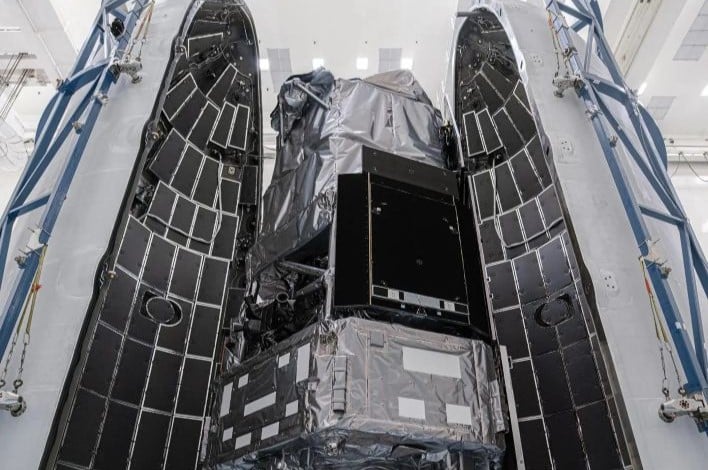 Roman being encapsulated in the rocket's payload fairing