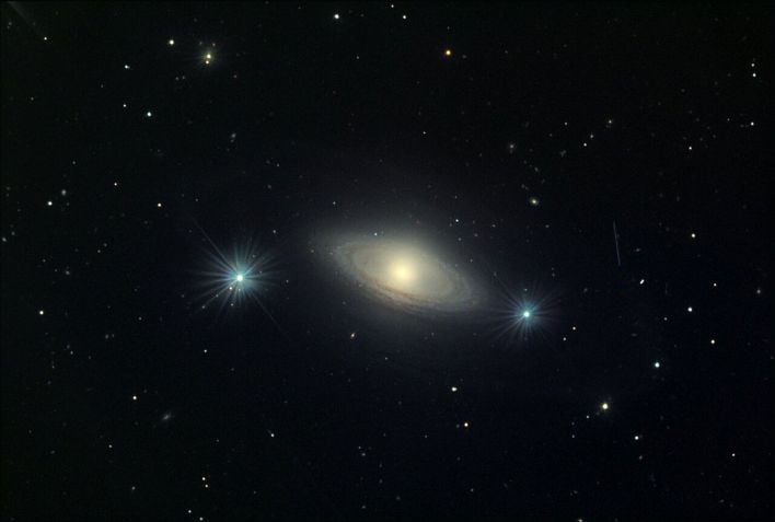 NGC 4698 is a barred spiral galaxy located among the Virgo cluster