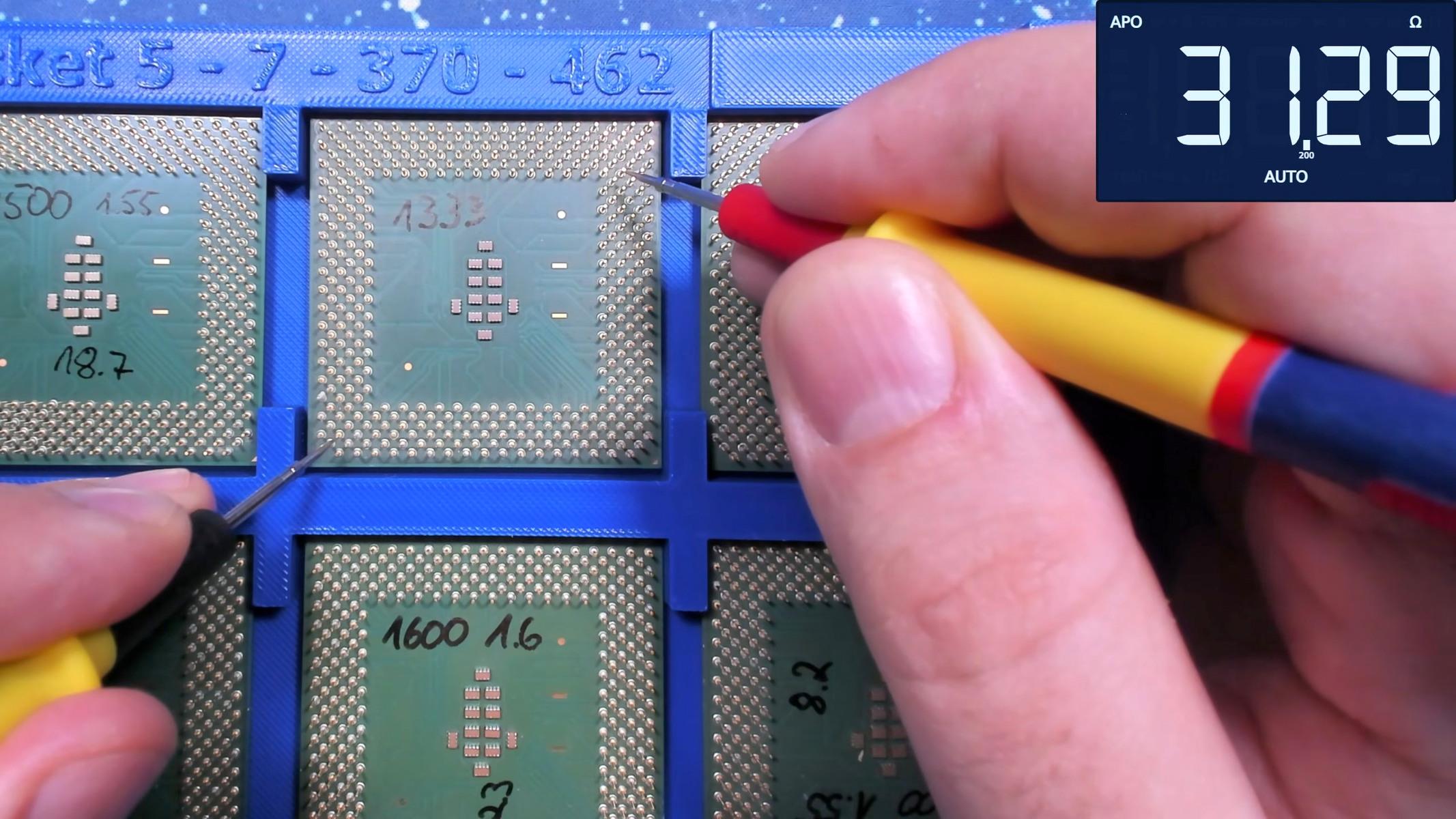 https://images.hothardware.com/contentimages/newsitem/71712/content/16x9_2133x1200_highres-bits-und-bolts-multimeter-cpu-resistance-testing.jpg