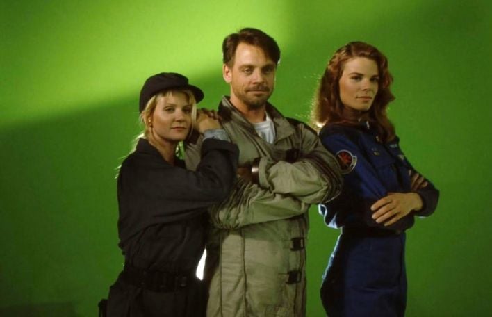 Ginger Lynn Allen (Rachel), Mark Hamill (Christopher Blair), and Jennifer MacDonald (Flint) in Wing Commander III