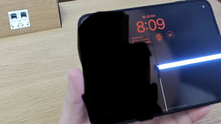 An iPhone Duo with a broken screen, after six hours of use